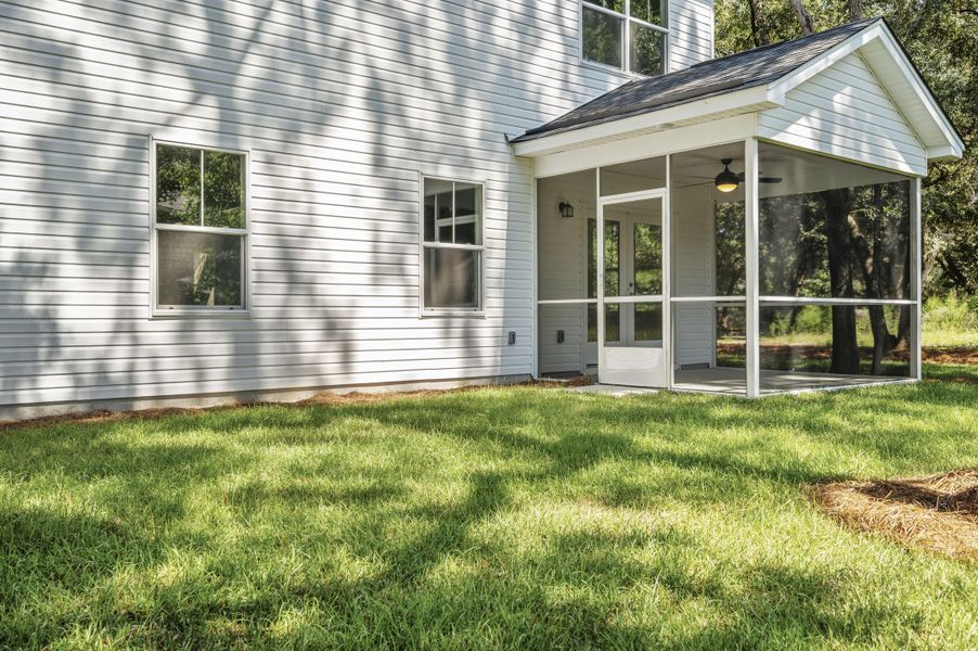 Exterior details and patio area of a home in , Johns Island (Image 3).