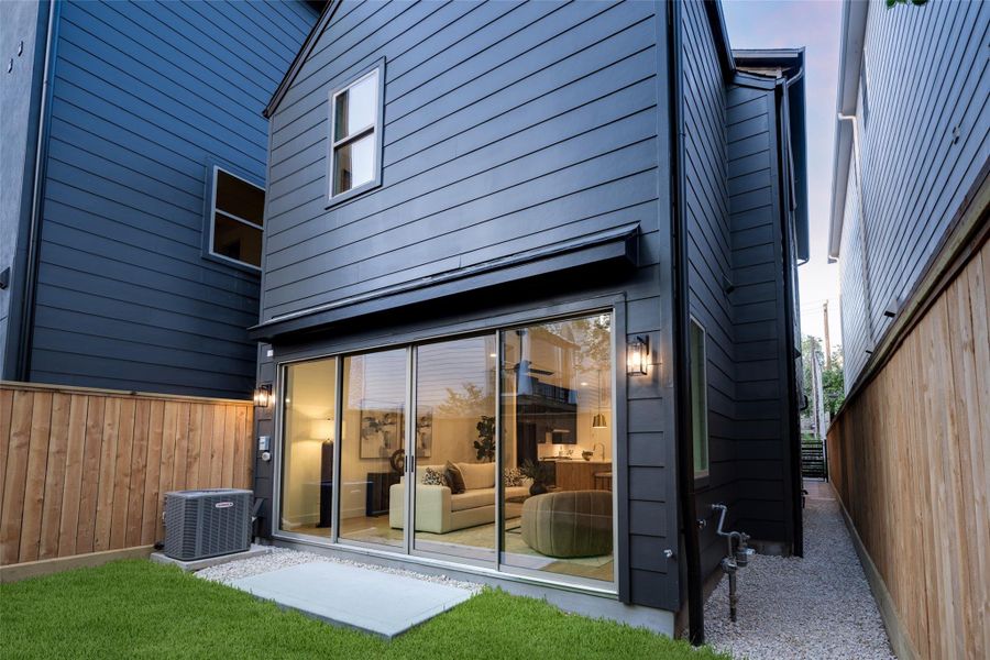 Exterior details and patio area of a home in , Houston (Image 3).