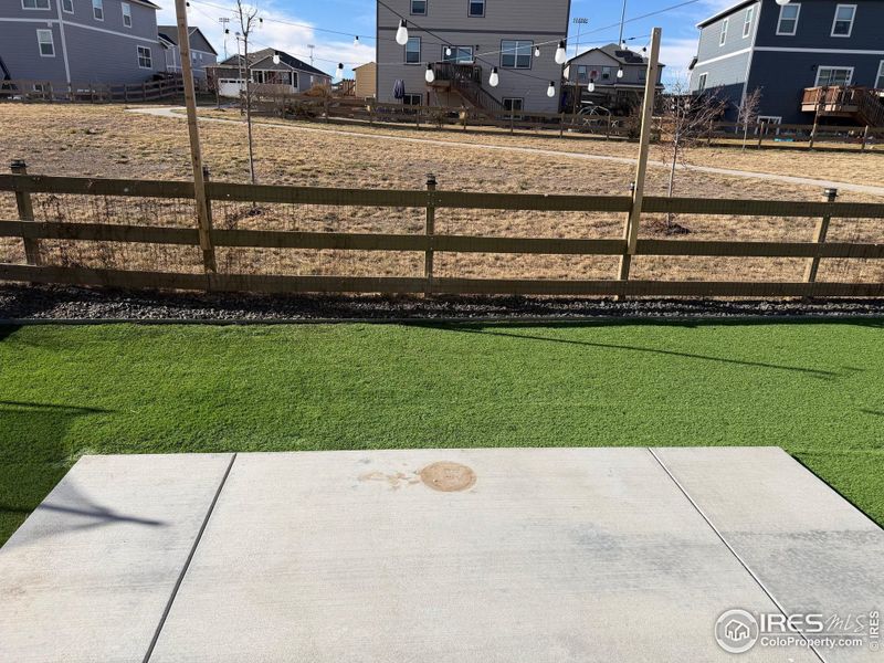 Concrete patio, by the open space Concrete patio, by the open space