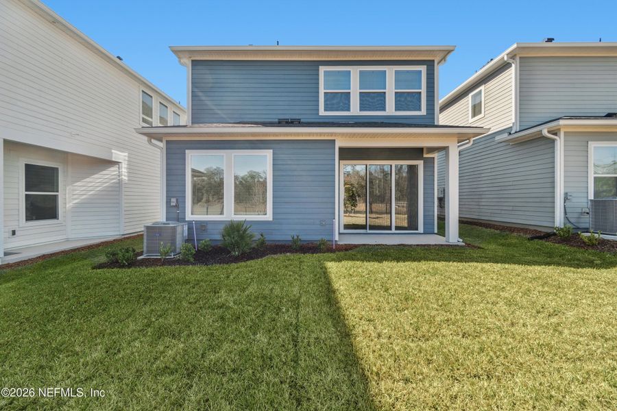 Exterior details and patio area of a home in Granville at eTown 38', Jacksonville (Image 2). Exterior details and patio area of a home in Granville at eTown 38', Jacksonville (Image 2).