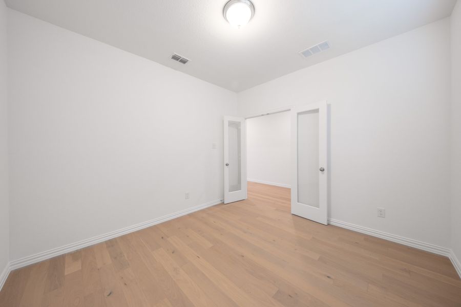 Spacious, unfurnished interior of a new home in Verandah, Royse City (Image 30).