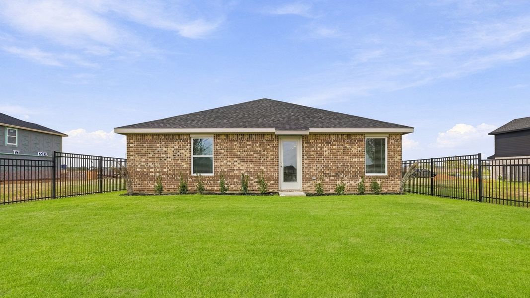 Exterior details and patio area of a home in Sunterra, Katy (Image 3).