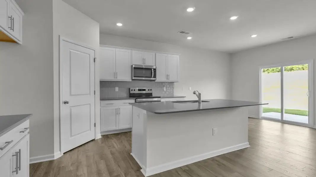 Furnished interior view inside a new home in The Preserve at Kinsley, Jamestown (Image 3). Furnished interior view inside a new home in The Preserve at Kinsley, Jamestown (Image 3).