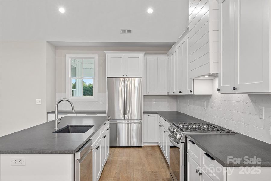 Furnished interior view inside a new home in , Harmony (Image 6).