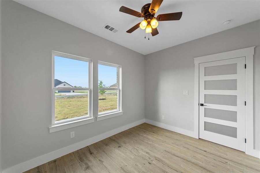 Bedroom 2 entry door and window