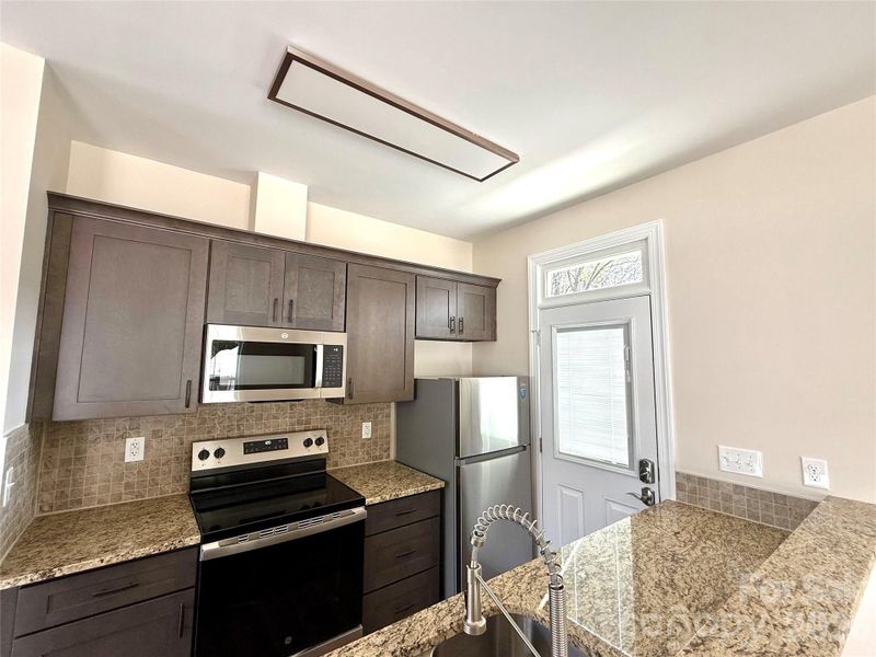 Furnished interior view inside a new home in , Concord (Image 4).