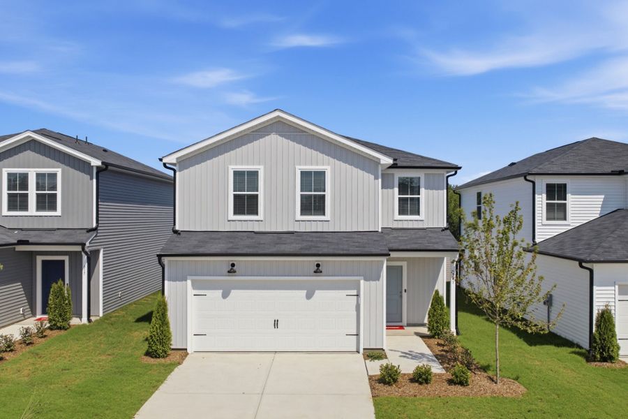 Front exterior of a new home in Carpenter Falls, Durham, NC, highlighting curb appeal (Image 30).