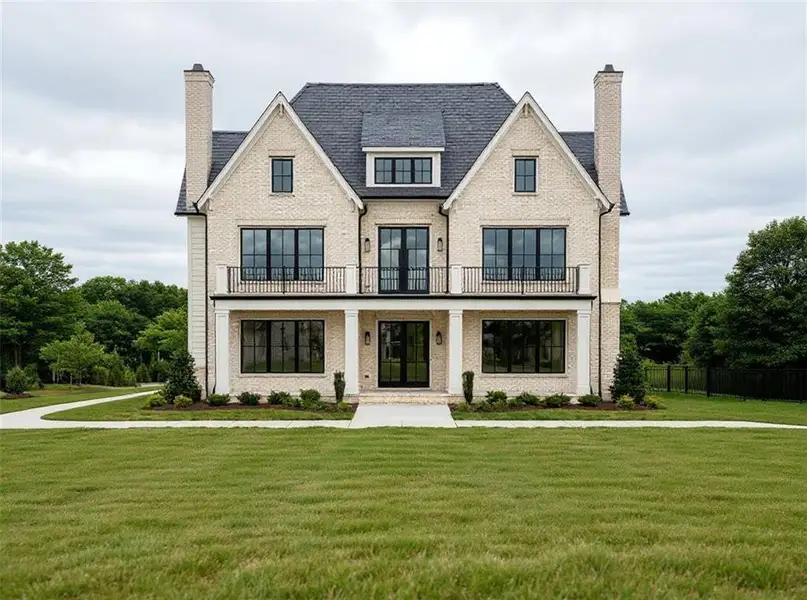 Front exterior of a new home in , Buford, GA, highlighting curb appeal (Image 1). Front exterior of a new home in , Buford, GA, highlighting curb appeal (Image 1).