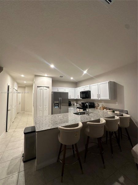 Furnished interior view inside a new home in , Florida City (Image 3).