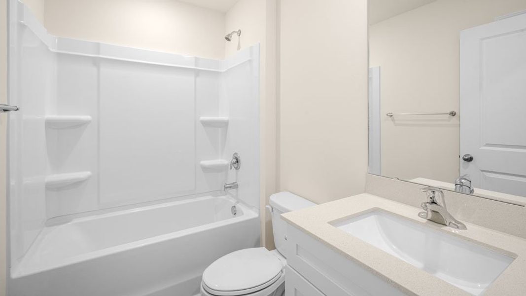 Representative furnished interior of a home built from the ARIA by D.R. Horton in Madeline Farm, New Bern (Image 3).