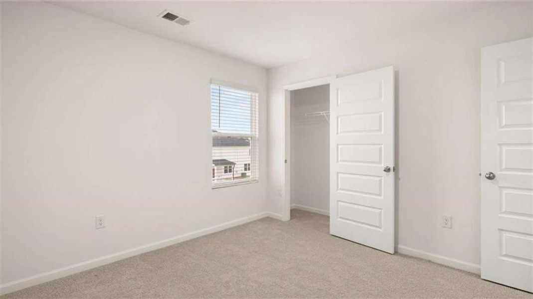 Spacious, unfurnished interior of a new home in Preserve at Dove Creek, Statham (Image 35).