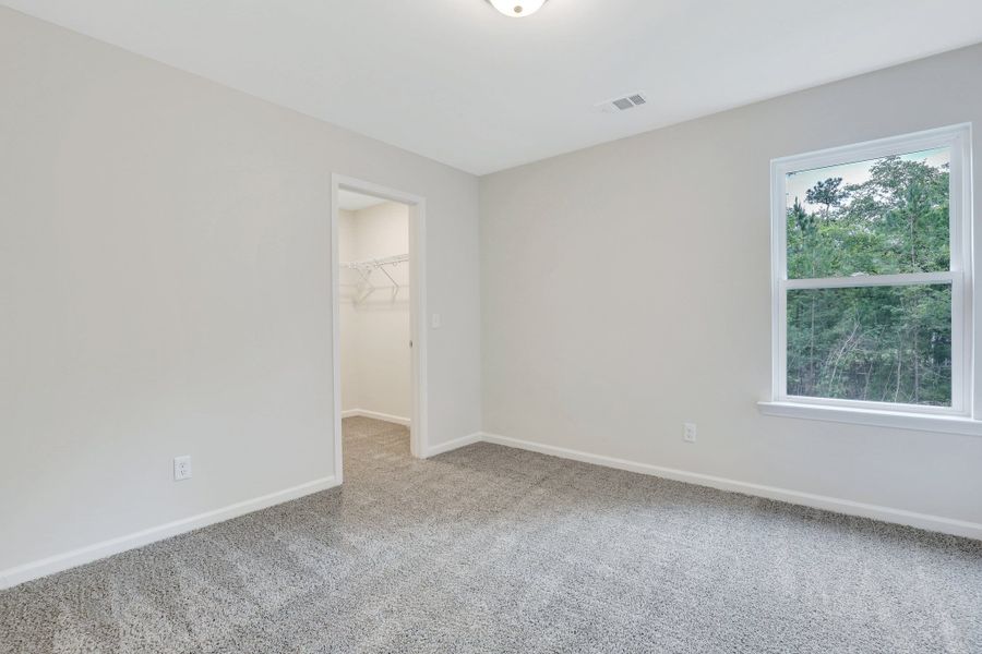 Representative unfurnished interior of a home built from the The Brookhaven by Smith Family Homes in Ramsey Landing, Rincon (Image 32).