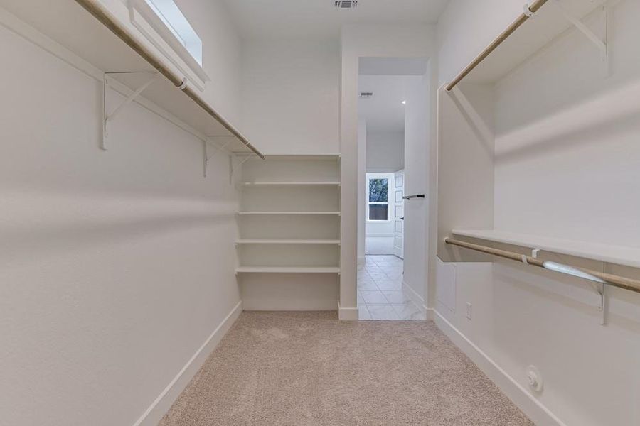 Owner's Closet  [Photo shown is from a completed home with the same floorplan and similardesign selections.]