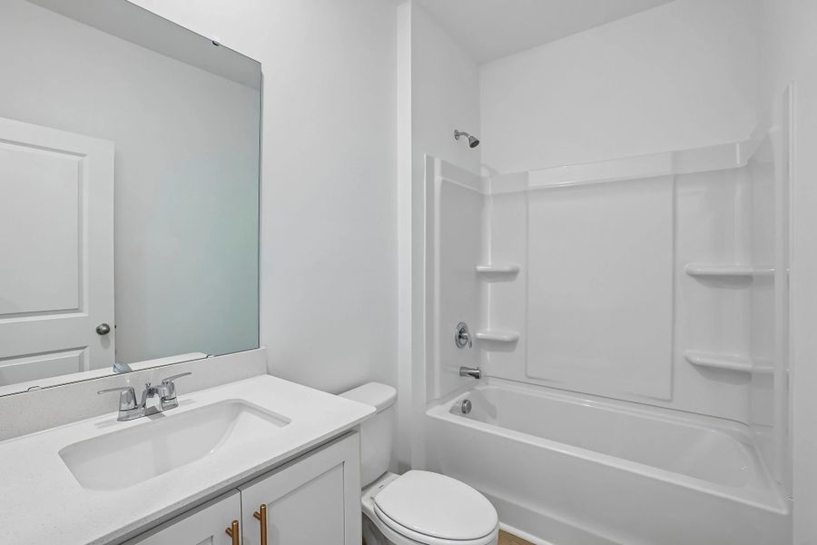 Bath 2 featuring the AW Collection® Serene - Earth-toned surfaces bring warmth and calm.