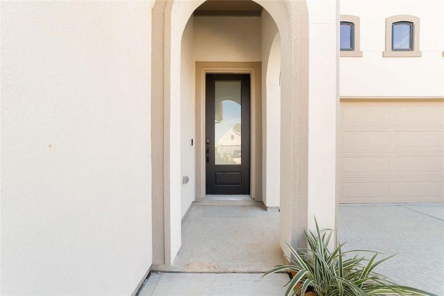 Exterior details and patio area of a home in Elyson 45' & 70', Katy (Image 3).