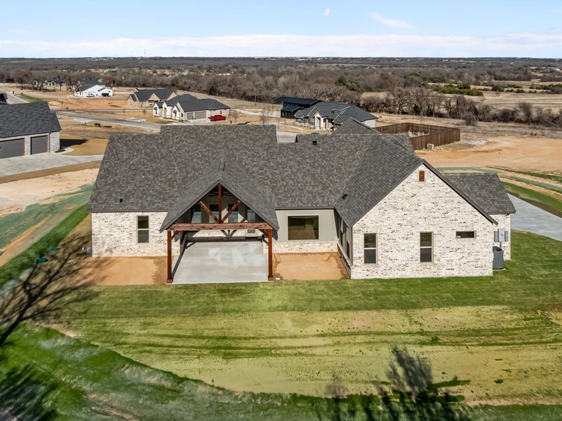 Exterior details and patio area of a home in Parker Meadows, Weatherford (Image 24).