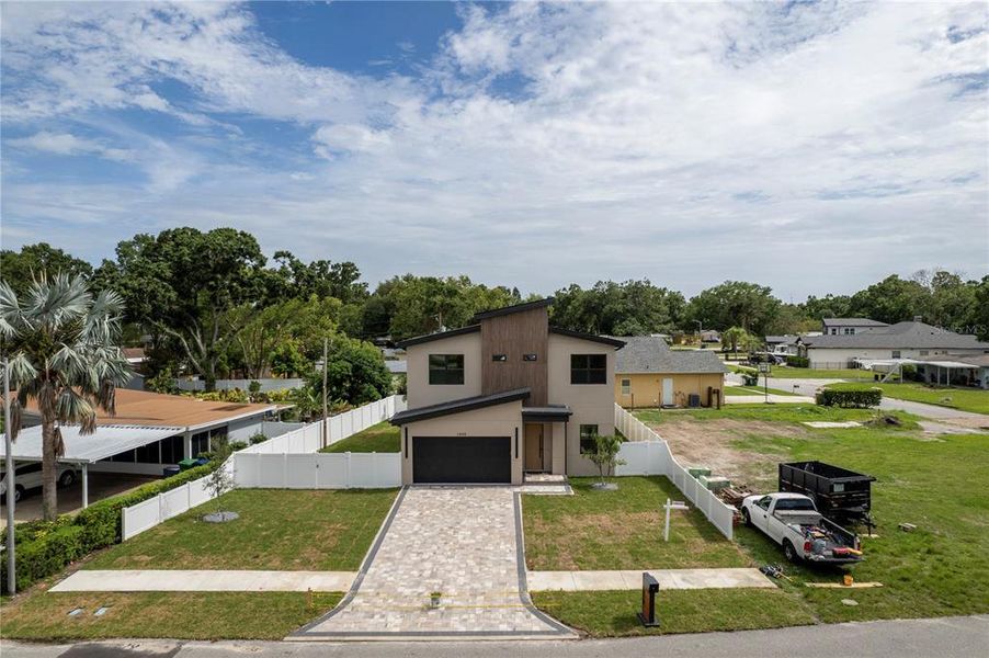 Front exterior of a new home in , Tampa, FL, highlighting curb appeal (Image 39).