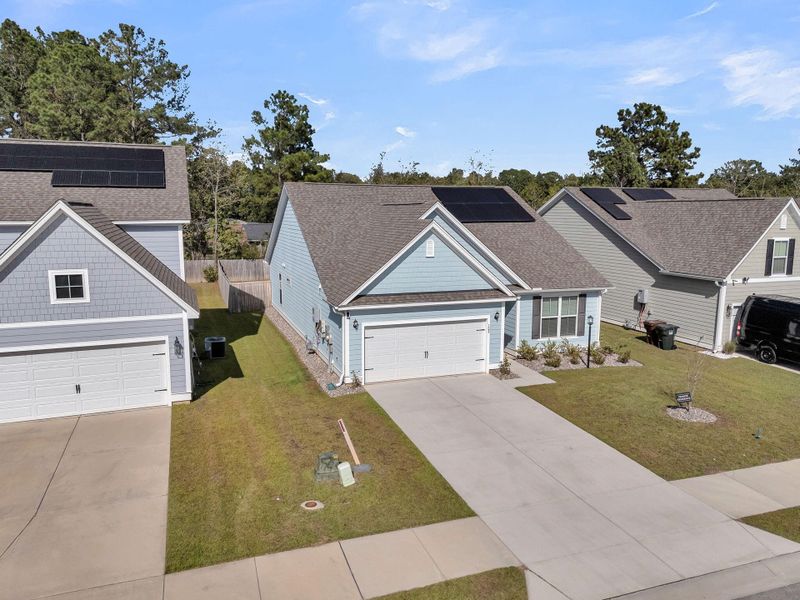 Front exterior of a new home in Abbey Walk, Moncks Corner, SC, highlighting curb appeal (Image 26).