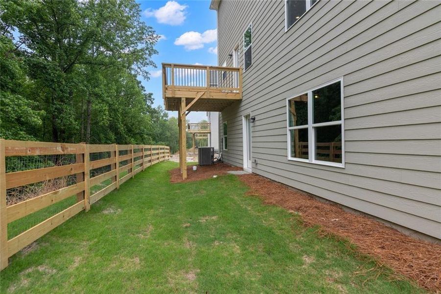 Exterior details and patio area of a home in Roxeywood Park, Winder (Image 4). Exterior details and patio area of a home in Roxeywood Park, Winder (Image 4).
