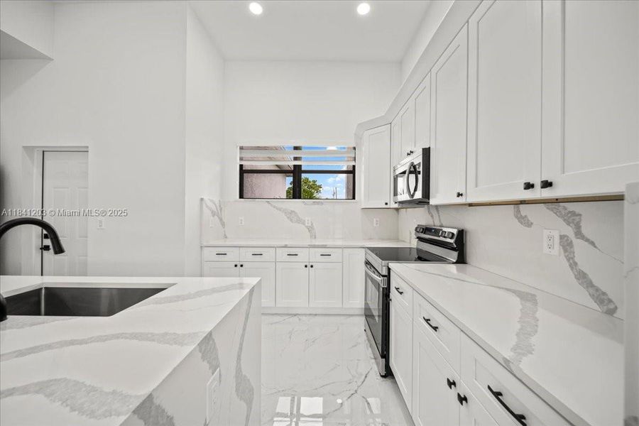 Furnished interior view inside a new home in , Cape Coral (Image 6). Furnished interior view inside a new home in , Cape Coral (Image 6).