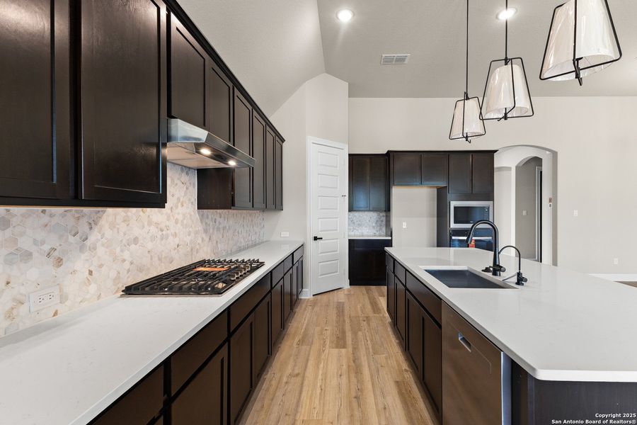 Furnished interior view inside a new home in The Enclave at Potranco Oaks, Castroville (Image 9).