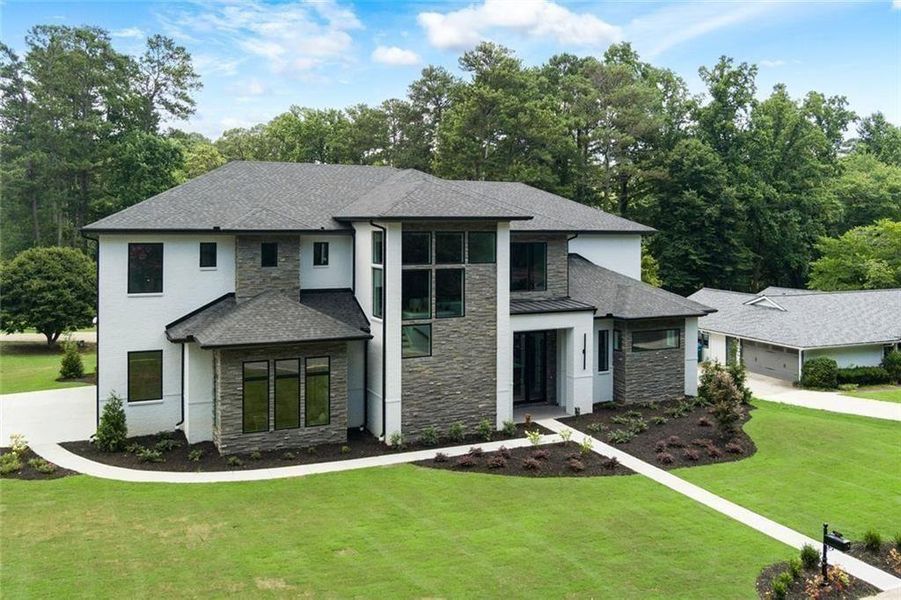 Front exterior of a new home in , Marietta, GA, highlighting curb appeal (Image 31).