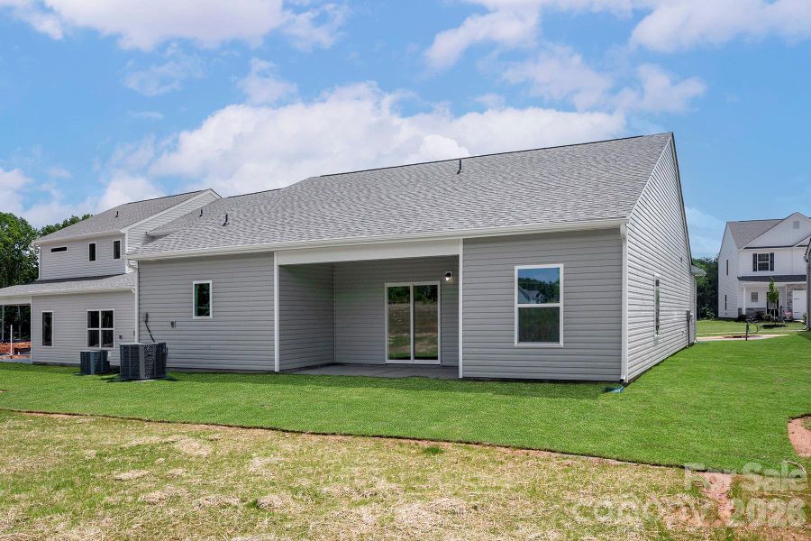 Exterior details and patio area of a home in Ascot Woods, Charlotte (Image 2). Exterior details and patio area of a home in Ascot Woods, Charlotte (Image 2).