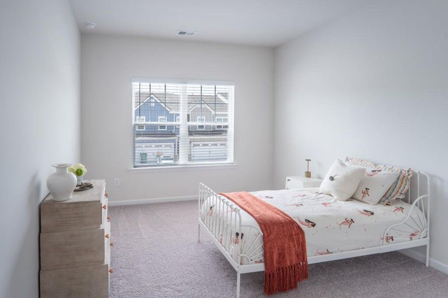 Furnished interior view inside a new home in Ellison Square, Sugar Hill (Image 19).