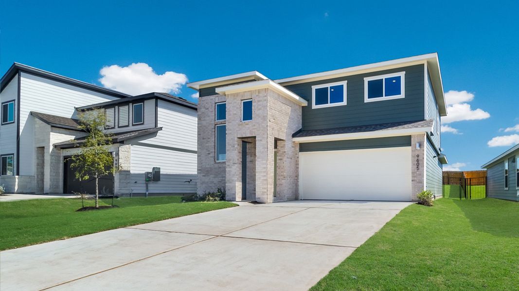Representative exterior photo of a completed home built from the The Kendall by D.R. Horton in Trails at Wildhorse, Austin, TX (Image 2). Representative exterior photo of a completed home built from the The Kendall by D.R. Horton in Trails at Wildhorse, Austin, TX (Image 2).