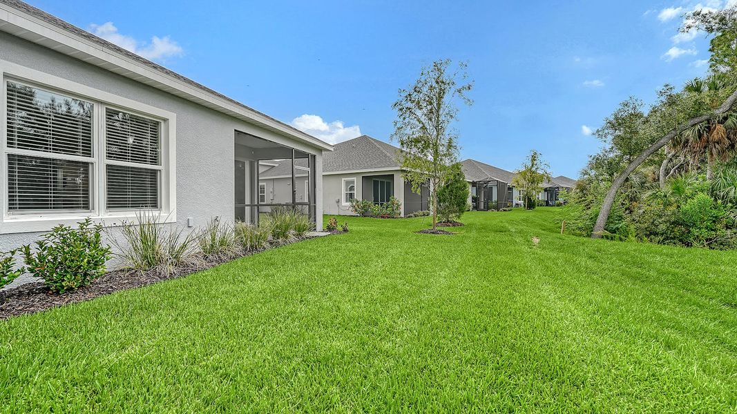 Exterior details and patio area of a home in Wildleaf Real Estate and Homes for Sale in Parrish, FL - Neal Communities, Parrish (Image 23).