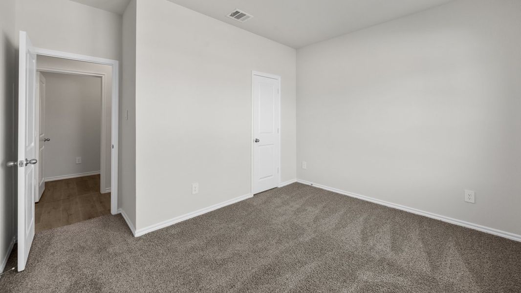 Spacious, unfurnished interior of a new home in Crane Crossing, Crandall (Image 24).