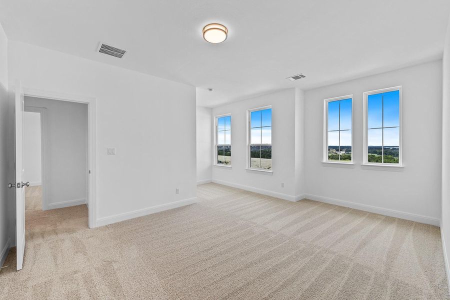 Spacious, unfurnished interior of a new home in Lariat - 80', Liberty Hill (Image 24). Spacious, unfurnished interior of a new home in Lariat - 80', Liberty Hill (Image 24).