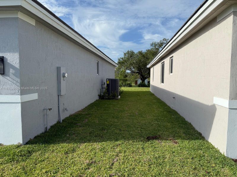 Exterior details and patio area of a home in , Homestead (Image 15). Exterior details and patio area of a home in , Homestead (Image 15).