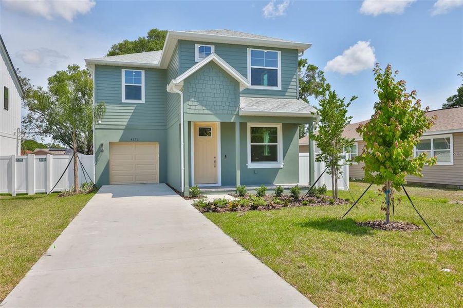Front exterior of a new home in , St. Petersburg, FL, highlighting curb appeal (Image 1). Front exterior of a new home in , St. Petersburg, FL, highlighting curb appeal (Image 1).