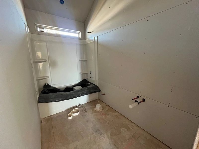 In-progress construction of a new home in Lariat, Liberty Hill, TX (Image 21).