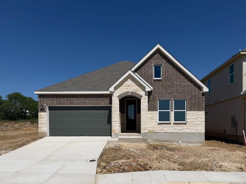 Front exterior of a new home in The Wilder, Adkins, TX, highlighting curb appeal (Image 1). Front exterior of a new home in The Wilder, Adkins, TX, highlighting curb appeal (Image 1).