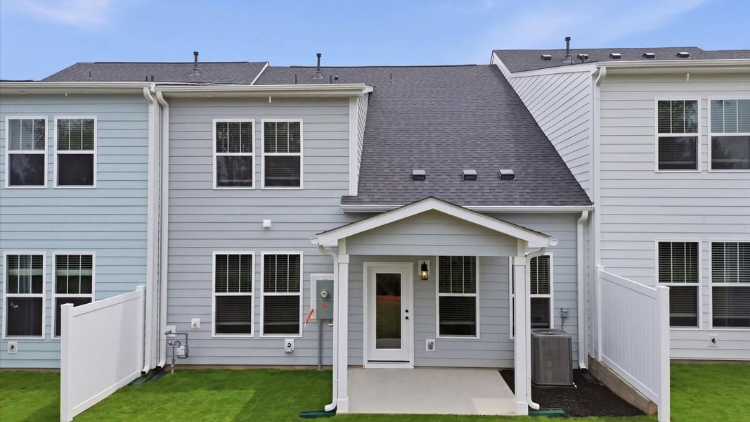 Exterior details and patio area of a home in Village at Midway, Anderson (Image 4).