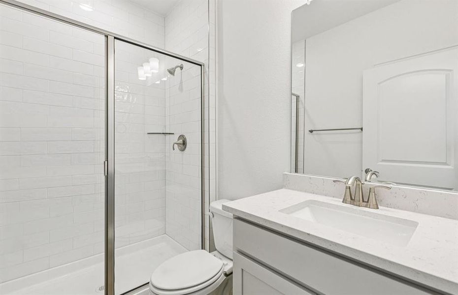 Guest bathroom with full shower on first level Guest bathroom with full shower on first level