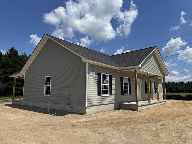 Front exterior of a new home in , St. George, SC, highlighting curb appeal (Image 13).