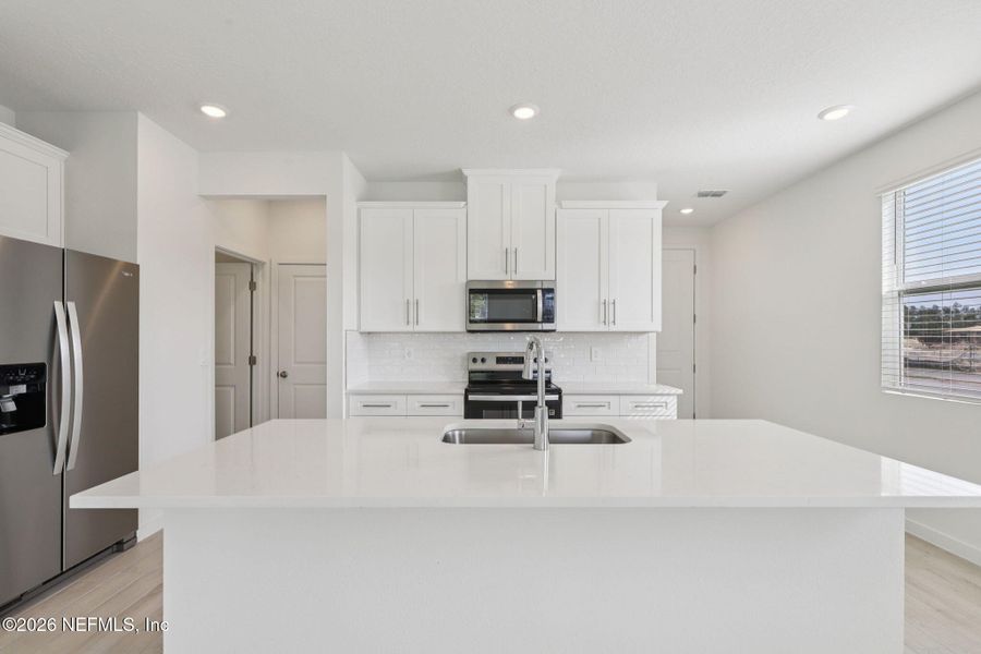 Furnished interior view inside a new home in Parkside at Shearwater, St. Augustine (Image 9).