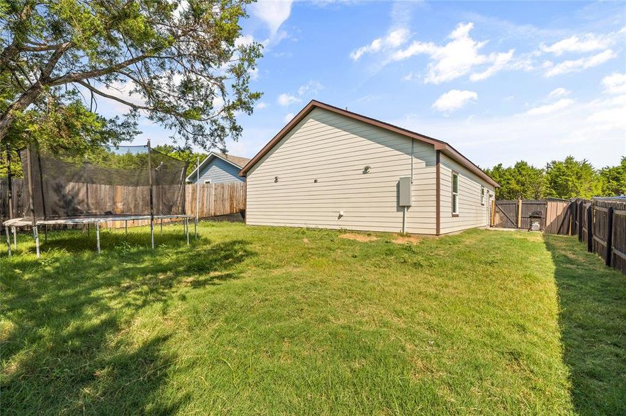 Front exterior of a new home in , Granbury, TX, highlighting curb appeal (Image 27). Front exterior of a new home in , Granbury, TX, highlighting curb appeal (Image 27).