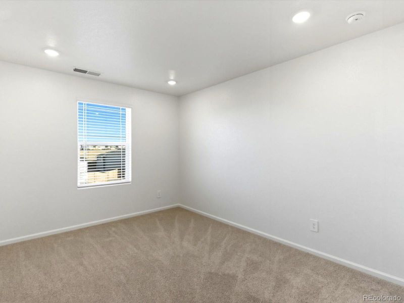 Spacious, unfurnished interior of a new home in Buffalo Highlands: The Flora Collection, Commerce City (Image 20).