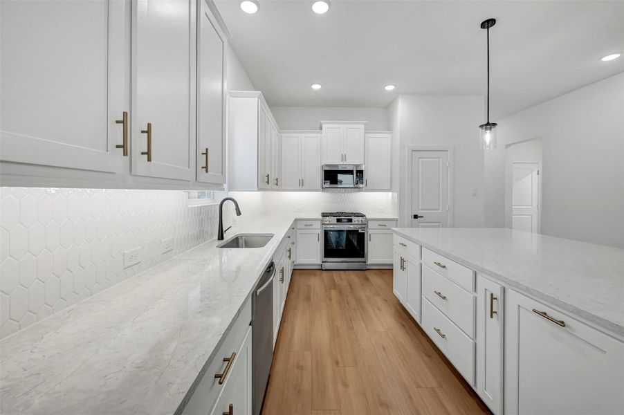 Furnished interior view inside a new home in The Grand Prairie 50’, Hockley (Image 7).