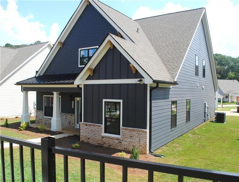 Exterior details and patio area of a home in Ferguson Corners, Emerson (Image 25).