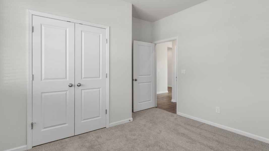 Spacious, unfurnished interior of a new home in Indigo Preserve, Leland (Image 27).