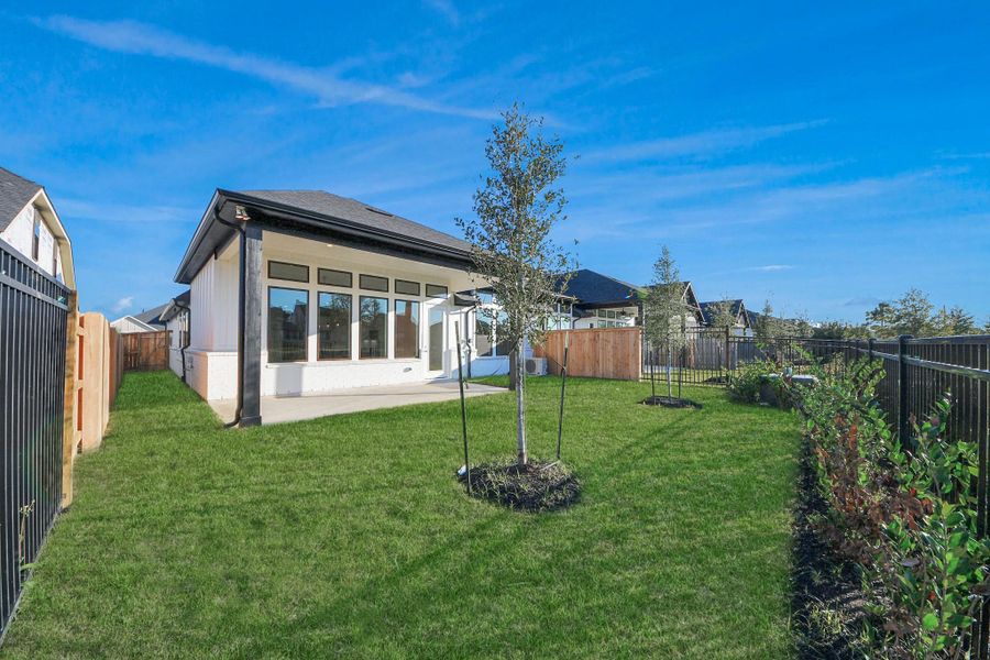 Exterior details and patio area of a home in Elyson, Katy (Image 28).