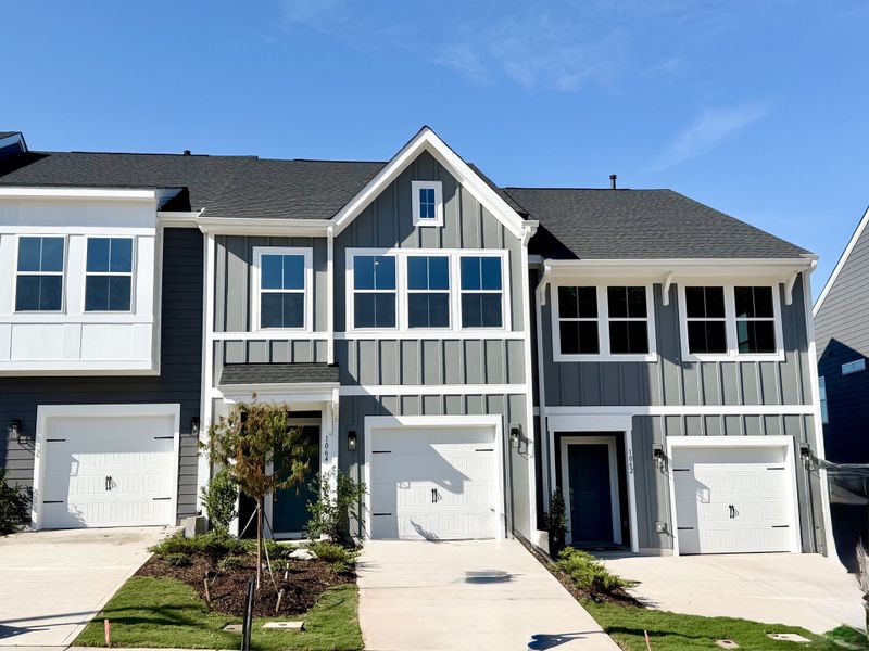 Front exterior of a new home in Sweetbrier, Durham, NC, highlighting curb appeal (Image 1). Front exterior of a new home in Sweetbrier, Durham, NC, highlighting curb appeal (Image 1).
