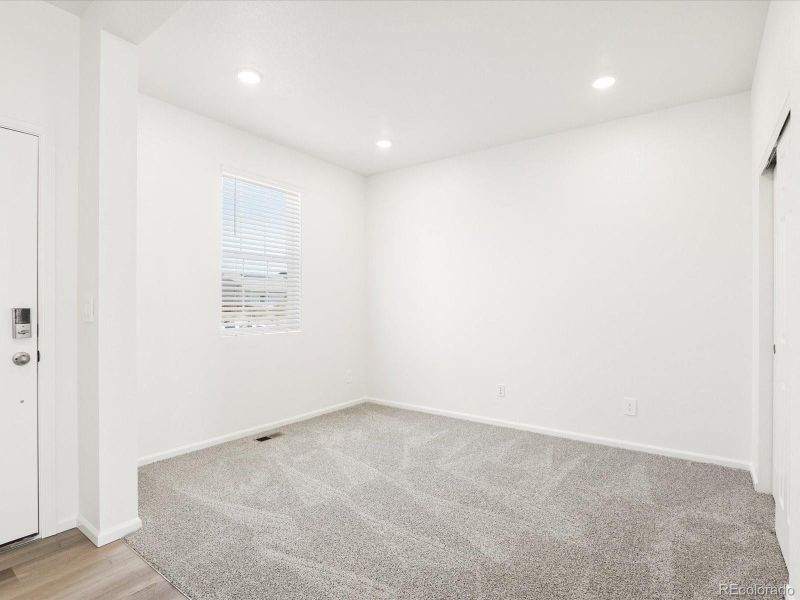 Spacious, unfurnished interior of a new home in Ridgeline Vista: The Flora Collection, Brighton (Image 21).