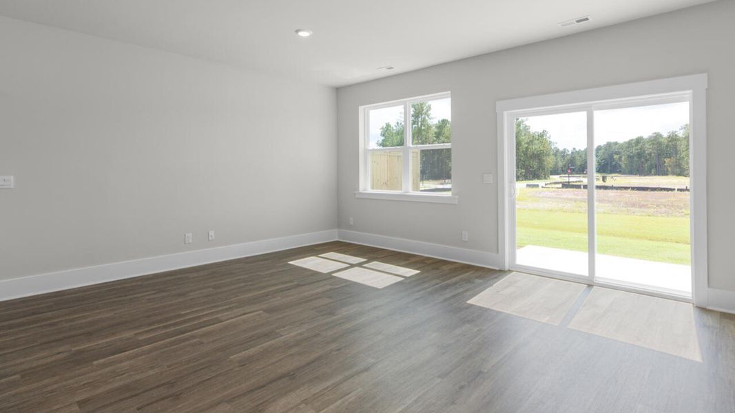 Representative unfurnished interior of a home built from the CARDINAL by D.R. Horton in Indigo Preserve Townhomes, Leland (Image 16).