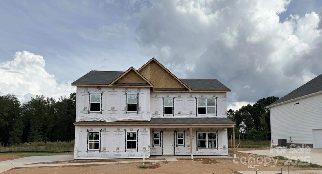 Front exterior of a new home in Cedar Meadows, Monroe, NC, highlighting curb appeal (Image 2).